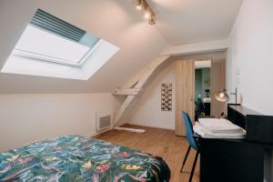 Maisons d'hotes Coeur de ville #H1 - Chambre privee dans logement partage - Wifi & Netflix - Centre ville & Transports - Machine a laver : photos des chambres