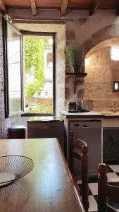 Appartements Entre Uzes et le Pont-du-Gard le Logis d'Autrefois : photos des chambres