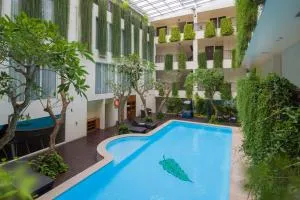 帕库布沃诺迪亚公寓式酒店 - 宾塔洛