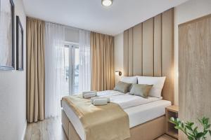 Pelikan Apartments - Parking w cenie - Parkplatz inklusive