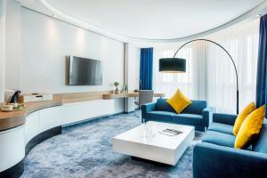 Suite 1 King Bed, 59 Sqm, Free Wifi, Working/Living Area, Bathroom With Shower, Smart Tv room in Golden Tulip Warsaw Airport