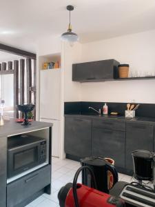 Appartements Au nom de la rose, beau 3 pieces en centre-ville : photos des chambres