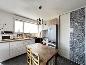 Appartements Le Pavot - appt 4p, climatise avec vue imprenable : photos des chambres