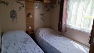 Campings Mobil home 3 ch domaine de kerlann pont aven wifi inclu : photos des chambres