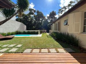 Casa 09 Floresta Boa Vista - Piscina Privativa, Jardim e Lazer Completo