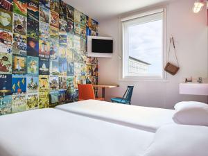 Hotels hotelF1 Saint Witz A1 Hotel : photos des chambres