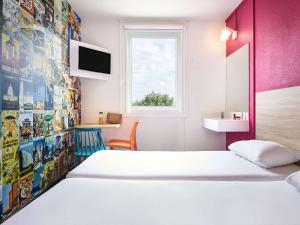 Hotels hotelF1 Saint Witz A1 Hotel : photos des chambres