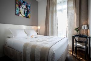 Hotels Le Manoir Hotel : photos des chambres