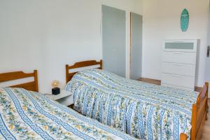 Maisons de vacances Grande maison familiale pour 8 avec jardin : photos des chambres