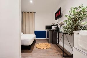 Appartements Ng Suite Home Jouffroy : photos des chambres