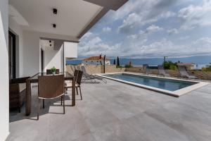 Villa Lavanda -semi-detached villa with a pool and a panoramic view, close to a sandy beach- by TRAVELER tourist agency Krk