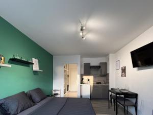 Appartements Studio Le Marechal - Pres frontiere et Netflix : photos des chambres