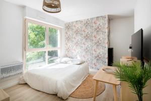 Appartements Terra Kota - Joli T2 a Corbeil-Essonnes : photos des chambres