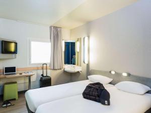 Hotels ibis budget Paris Porte De Montmartre : photos des chambres