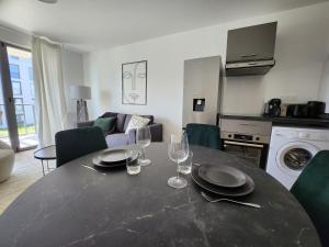 Appartements Le Quai des Verts : photos des chambres