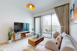 Vacationer Holiday Homes l 1 Bedroom Apartment l Close to Burj Khalifa l Pool Access & Free Wi-Fi