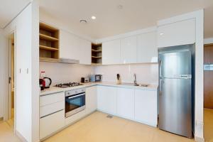 Vacationer Holiday Homes l 1 Bedroom Apartment l Close to Burj Khalifa l Pool Access & Free Wi-Fi