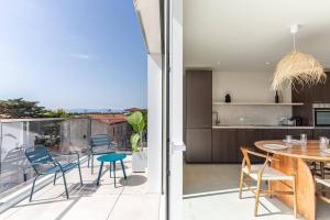 Appartements Appartement luxueux avec grande terrasse vue mer : photos des chambres