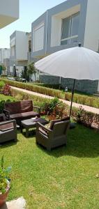 Appartement Familial avec Jardin, Résidence avec Piscine Dar El Bahr