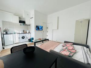 Appartements Studio cosy proche de Paris : photos des chambres