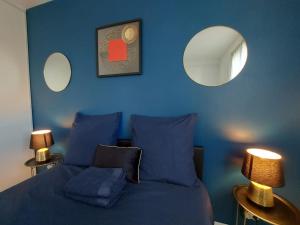 Appartements LE CHIC ETHNIC DREUX 52m2 50 min de PARIS proche GARE ET CENTRE VILLE PARKING GRATUIT : photos des chambres