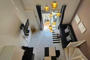 Appartements Evasion Romantique avec spa et sauna : photos des chambres