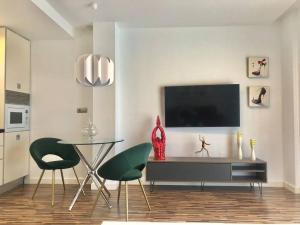 Apartamento céntrico con plaza de garaje y piscina