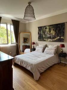 Appartements Maison de charme avec jardin : photos des chambres