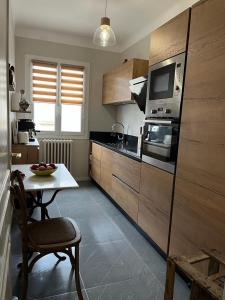 Appartements Maison de charme avec jardin : photos des chambres