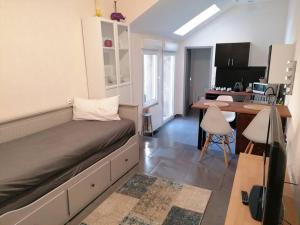 Appartements Coeur de ville avec terrasse : photos des chambres