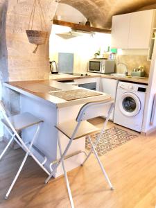 Appartements Petit loft sur jardin en centre-ville : photos des chambres