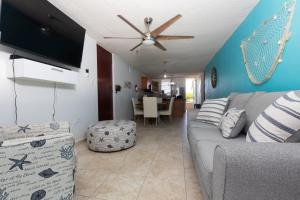 Coqui Beach Home, Paseo del Faro Combate