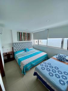 Apartamento aL-4 frente al mar piscina y Wifi