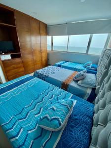 Apartamento aL-4 frente al mar piscina y Wifi