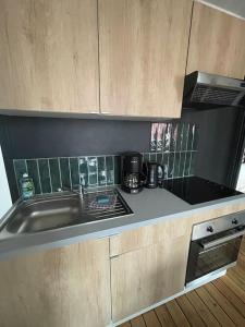 Appartements Confort - 4 pers - WIFI - plage a 400 m : photos des chambres