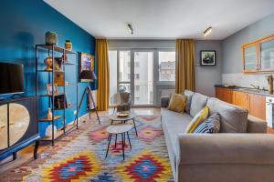 Stylish and colorful apartment with balcony in center