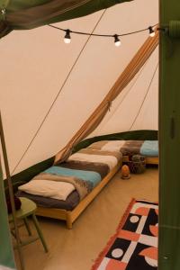 Tentes de luxe 3 Luxe tent bij La Ferme de l'aventure Ronnet : photos des chambres