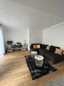 Appartements Superbe appartement moderne en rez-de-chaussee : photos des chambres