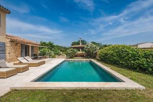 Villas Bastide-style property with pool and grape vines : photos des chambres