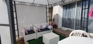 Appartements Bas de maison de village cosy & relax : photos des chambres