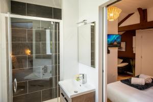 Appartements Appart-hotel de standing avec jacuzzi privatisable en option : photos des chambres