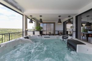 Villas Villa climatisee spa piscine billard ping-pong : photos des chambres