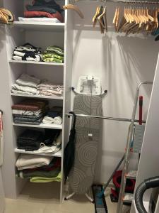 White and Bright Riverside View Flat with Parking, Bike Access, and Onsite Gym