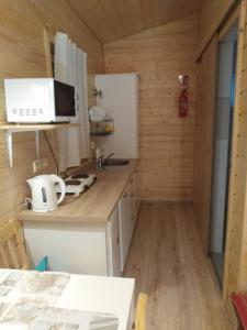 Domek nad jezioremSeehaus 1A (SławnoŁętowo)