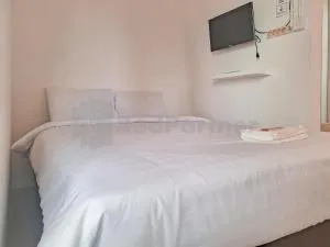 Adam Guesthouse Mitra RedDoorz - Kamparganya