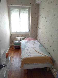 Sejours chez l'habitant Petite chambre meublee au coeur de ville - chez l'habitant : photos des chambres