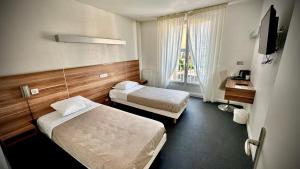 Hotels Logis Hotel Restaurant L'Europe : Chambre Lits Jumeaux