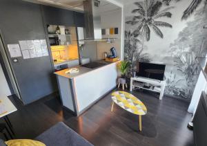 Appartements 'Les Tropiques' - Parking prive - Balcon - Tout confort : photos des chambres