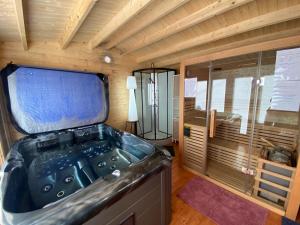 Maisons de vacances Nid du merle avec sauna et jacuzzi privatif : photos des chambres