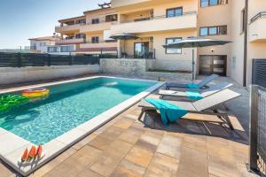 Apartments Bluemare with Shared Pool